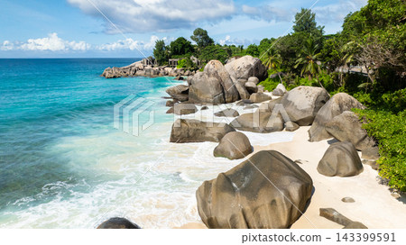 Sandy beach with turquoise water. Seychelles, Mahe. Carana Beach Sandy beach with turquoise water. Seychelles, Mahe. Carana Beach 143399591