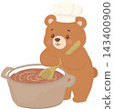 Cute cartoon bear wearing a chef hat and stirring a pot of warm homemade soup with a wooden spoon. 143400900