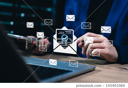 Verified email communication and digital messaging concept. Businesswoman using laptop and phone with multiple email icon and confirmed email symbol representing secure mail delivery, inbox management Verified email communication and digital messaging concept. Businesswoman using laptop and phone with multiple email icon and confirmed email symbol representing secure mail delivery, inbox management 143401060