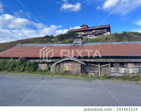 Former Omi family guardhouse, front view, Otaru City, Hokkaido, autumn. Former Omi family guardhouse, front view, Otaru City, Hokkaido, autumn. 143401224