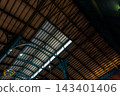 View up from the large hall, the steel frame of a large curved roof 143401406