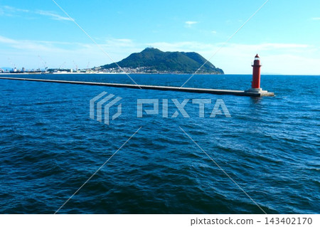 The red lighthouse at the entrance to Hakodate Port and Mount Hakodate. The red lighthouse at the entrance to Hakodate Port and Mount Hakodate. 143402170