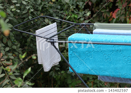 white shirt hanging on the shopping cart white shirt hanging on the shopping cart 143402597
