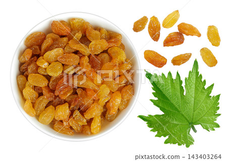 Yellow Raisins in ceramic bowl isolated on white background. Top view. Flat lay Yellow Raisins in ceramic bowl isolated on white background. Top view. Flat lay 143403264