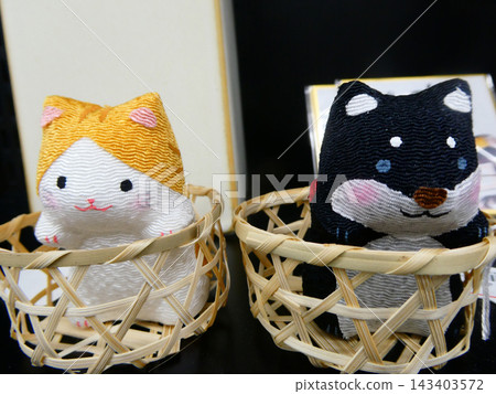 Cute Japanese cat and dog mascots made from kimono fabric 143403572