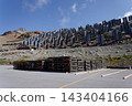 Solar panels lying on ground with vertically mounted four wings around central column, photovoltaic plant avoid snow accumulation, maintain high yields, Alps, future innovation energy concept 143404166