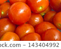 Fresh Cherry Tomatoes Close-Up: Vibrant Red Produce for Culinary Inspiration 143404992