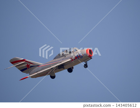 31 August 2019 Russia Zhukovsky MAKS MiG-15UTI Soviet jet fighter performing a demonstration flight at the international aviation and space show 31 August 2019 Russia Zhukovsky MAKS MiG-15UTI Soviet jet fighter performing a demonstration flight at the international aviation and space show 143405612