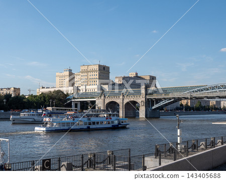 10 August 2026 Russia Moscow riverboat sailing along the Moskva River with the historic Ministry of Defense building on Frunzenskaya Embankment in the background 10 August 2026 Russia Moscow riverboat sailing along the Moskva River with the historic Ministry of Defense building on Frunzenskaya Embankment in the background 143405688