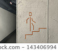 Minimalist stair-climbing diagram on concrete 143406994