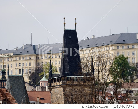 Expressive city scene combining ancient stone towers with modern palace and window arrangements Expressive city scene combining ancient stone towers with modern palace and window arrangements 143407375