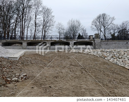 Natural and constructed materials combined to showcase functional infrastructure in outdoor environment 143407481