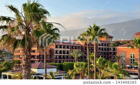 Experience tropical hotel bliss with palm trees and breathtaking views that transport you Experience tropical hotel bliss with palm trees and breathtaking views that transport you 143408165