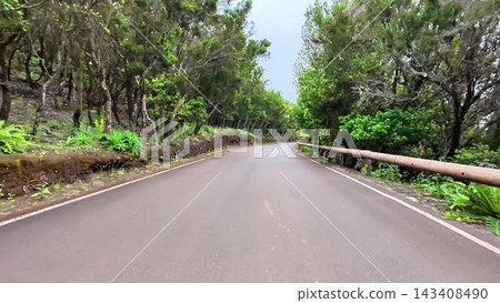 A Scenic and Beautiful Winding Road That Meanders Through the Lush Greenery of the Countryside A Scenic and Beautiful Winding Road That Meanders Through the Lush Greenery of the Countryside 143408490