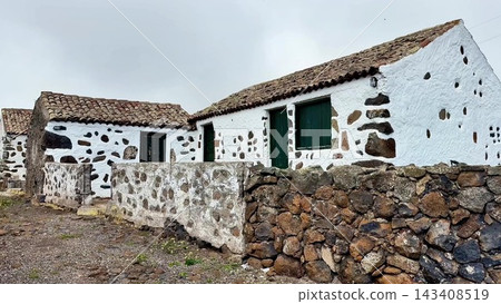 Charming Whitewashed Houses with Beautiful Stone Walls Surrounded by Scenic Nature 143408519