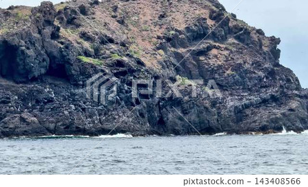 Experience the Stunning Rocky Coastline View with Waves Crashing Against Dramatic Cliffs Experience the Stunning Rocky Coastline View with Waves Crashing Against Dramatic Cliffs 143408566