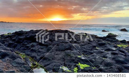 Experience the breathtaking and stunning sunset that lights up the Rocky Shoreline beautifully Experience the breathtaking and stunning sunset that lights up the Rocky Shoreline beautifully 143408581