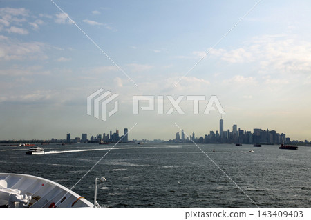 Manhattan's skyscrapers as seen from a boat on the Hudson River Manhattan's skyscrapers as seen from a boat on the Hudson River 143409403
