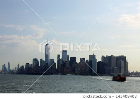 Manhattan's skyscrapers as seen from a boat on the Hudson River 143409408
