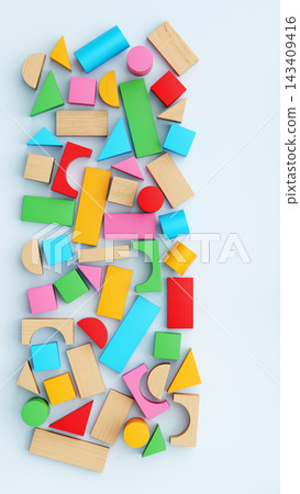 Multicolored Wooden and Plastic Toy Building Blocks Flat Lay Background Multicolored Wooden and Plastic Toy Building Blocks Flat Lay Background 143409416