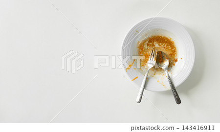 Dirty plate top view background, finished eat dinner in restautant, abstract textuer stain smearing drip sauce bbq jam chilli jelly on ceramic breakfast, concept for clean hyginene product. 143416911