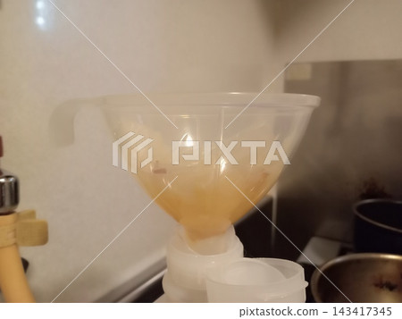 Strain the used oil. Strain the used oil. 143417345