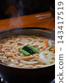 Steaming hot udon noodles 143417519