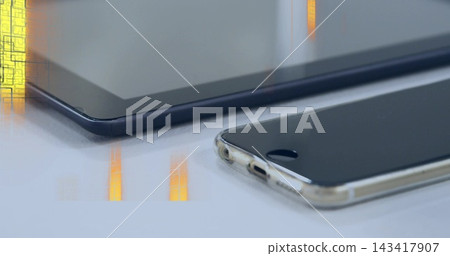 Resting smartphone in clear case showing home button on glossy desk, tablet reflections, copy space Resting smartphone in clear case showing home button on glossy desk, tablet reflections, copy space 143417907