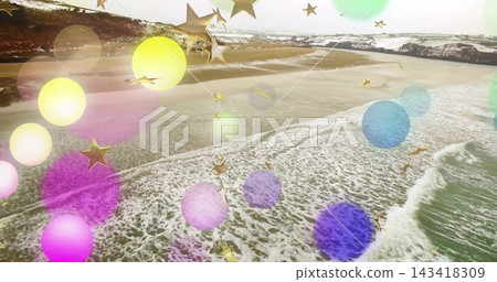 Showing shoreline and surf rolling onto wet sand on beach, bokeh circles and gold stars overlaying Showing shoreline and surf rolling onto wet sand on beach, bokeh circles and gold stars overlaying 143418309