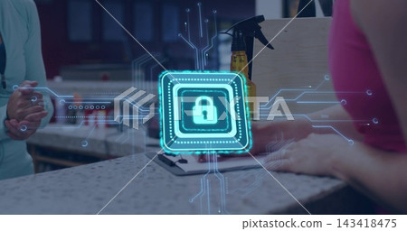 Tapping woman in pink top placing payment device at service desk completing sale with padlock icon Tapping woman in pink top placing payment device at service desk completing sale with padlock icon 143418475