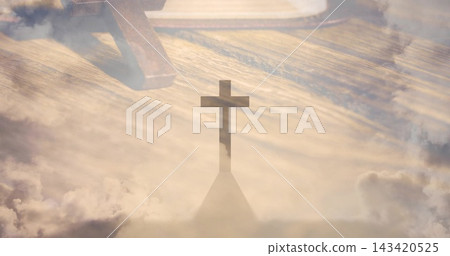Displaying dark Latin cross silhouette overlaying sunlit wooden altar and cloud field, with pew leg Displaying dark Latin cross silhouette overlaying sunlit wooden altar and cloud field, with pew leg 143420525
