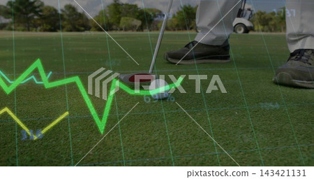 Putting golfer lining up putt on green, light pants, dark shoes, with ball, putter, overlays Putting golfer lining up putt on green, light pants, dark shoes, with ball, putter, overlays 143421131
