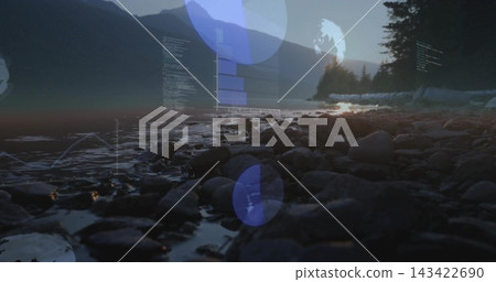 Showing wet round rocks and puddles reflecting dawn light on rocky shore, with translucent overlays Showing wet round rocks and puddles reflecting dawn light on rocky shore, with translucent overlays 143422690
