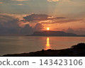 Sunset over the Mediterranean Sea with golden reflections on the water and clouds in Palermo, Sicily 143423106