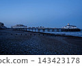 A rare glimpse of Eastbourne Pier before the fire: a panoramic view at dusk in England. 143423178