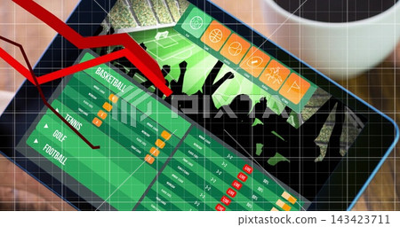 Showing tablet displaying green betting UI on wooden tabletop with red down arrow and LIVE tags Showing tablet displaying green betting UI on wooden tabletop with red down arrow and LIVE tags 143423711