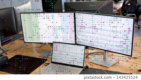 Displaying two external monitors and laptop showing spreadsheets at open-plan office, with cables Displaying two external monitors and laptop showing spreadsheets at open-plan office, with cables 143425524