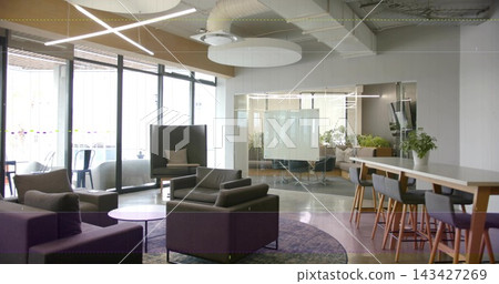 Displaying grey lounge chairs arranged around round tables in modern office lounge, with purple rug Displaying grey lounge chairs arranged around round tables in modern office lounge, with purple rug 143427269