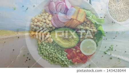 Showing white ceramic bowl blending with beach shoreline overlay on kitchen table, avocado Showing white ceramic bowl blending with beach shoreline overlay on kitchen table, avocado 143428044