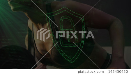 Leaning woman in dark sports bra bracing on bench at dim gym, holo shield showing padlock 143430430