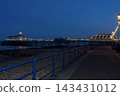 A rare glimpse of Eastbourne Pier before the fire, illuminated at night in England. 143431012