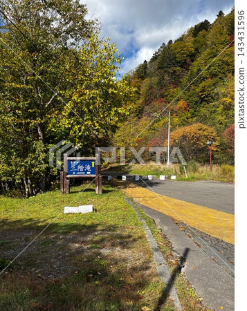 A signpost and autumn scenery at "Sankai Falls," a scenic spot in Otaki district, Date City, Hokkaido. A signpost and autumn scenery at "Sankai Falls," a scenic spot in Otaki district, Date City, Hokkaido. 143431596