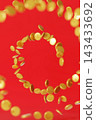 Coins are arranged in a spiral pattern against a red background, creating a finance theme. This design offers space for additional text or branding 143433692