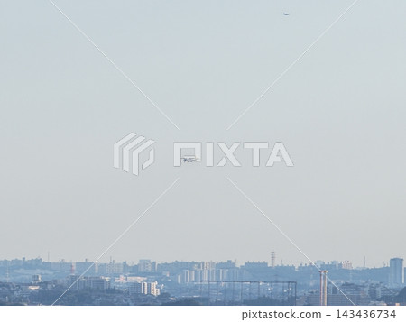 <Aerial view of Chofu> Airplanes landing at Chofu Airport in autumn. <Aerial view of Chofu> Airplanes landing at Chofu Airport in autumn. 143436734