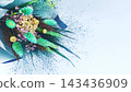 Elegant dried flower bouquet in turquoise, green and purple tones on a light blue background, with generous copy space for wedding, celebration, floral design, and spring concepts. 143436909