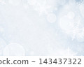 A Christmas background with bokeh and small snowflakes 143437322