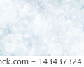 A Christmas background with bokeh and small snowflakes 143437324