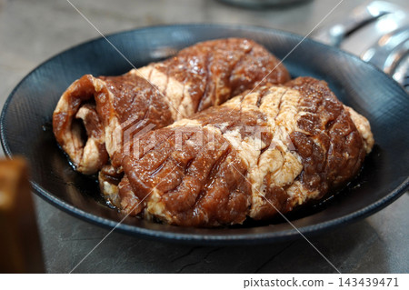 Korean BBQ Marinated Pork Ribs Galbi Grilling on Charcoal Mesh 143439471