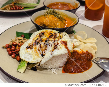 Malaysian cuisine: Rice with coconut milk (nasi lemak) Malaysian cuisine: Rice with coconut milk (nasi lemak) 143440712