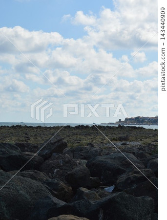 Stone plateau on the seashore, view of Nessebar, sea and sky 143440909